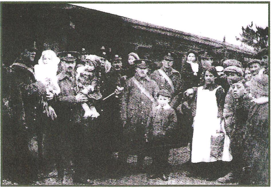 This picture shows men of ‘D’ Company, the 1st Battalion Herefordshire Regiment. The men are possibly shown here saying their farewells to their families at Kington railway station before their departure to war.
